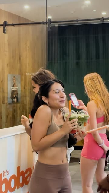 Guests at an event with boba drinks