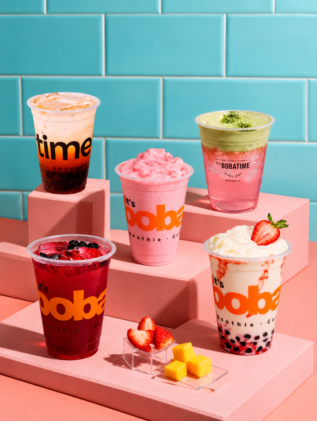 Studio shot of mango, brown sugar, and pistachio boba drinks on a checkered surface