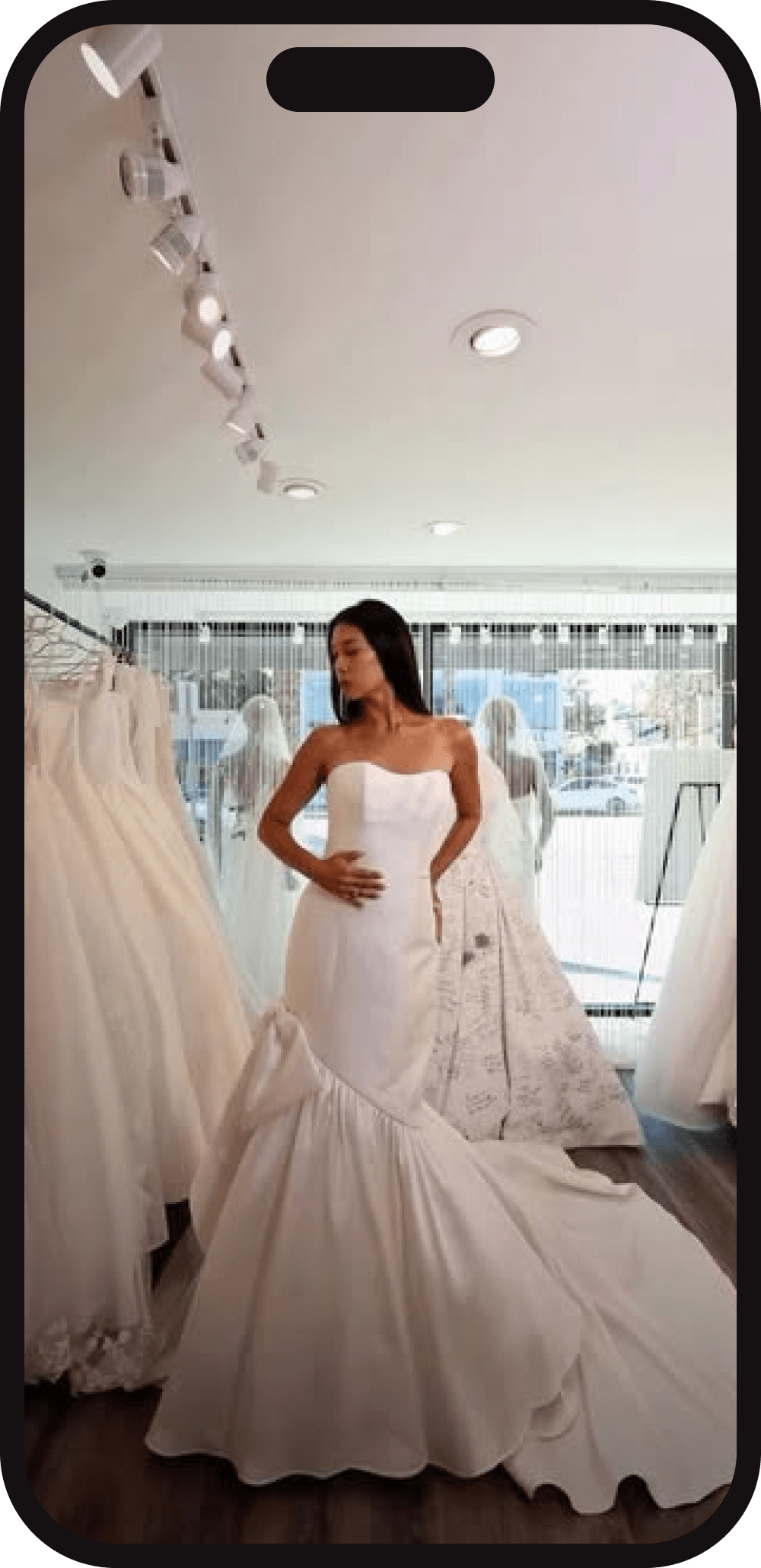 Rachel & Rose bridal gown reel on phone